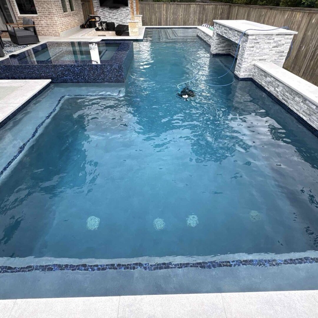 Luxury pool with mosaic spa tile in Cypress TX